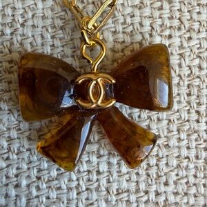 Upcycled acrylic Brown Bow Pendant Necklace